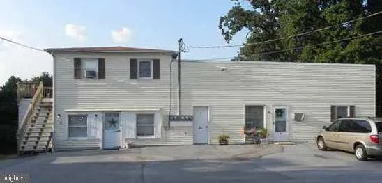 a view of a house with a patio