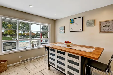 a room with a table and a window