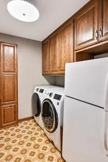 a storage room with washer and dryer