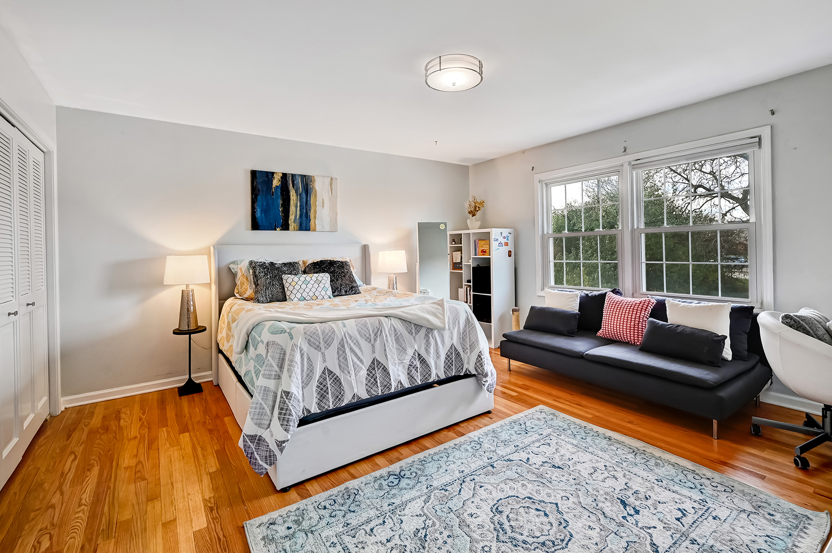 6750 County Line Lane Burr Ridge, IL 60527 - Photo 21 of 35 a bedroom with a bed and glass window