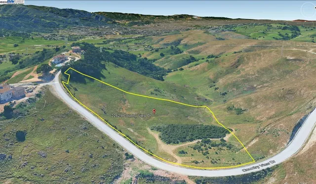 a view of a wooden floor with a lake view