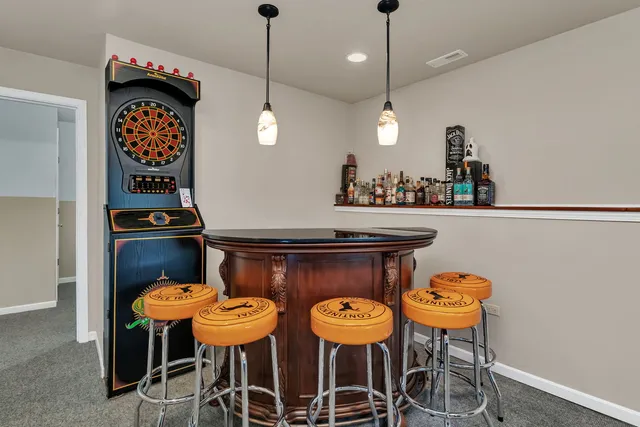 a room with furniture and wooden floor