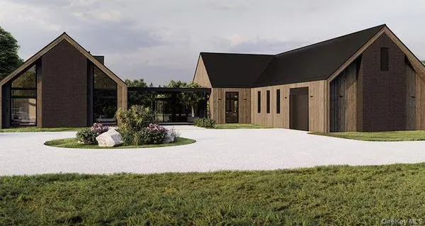 a view of a house with backyard and porch