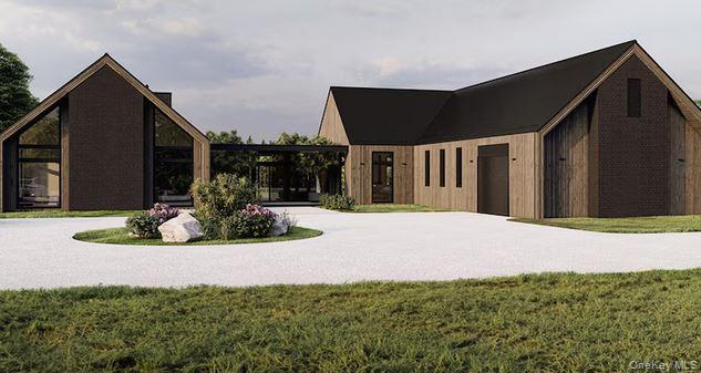 a view of a house with backyard and porch