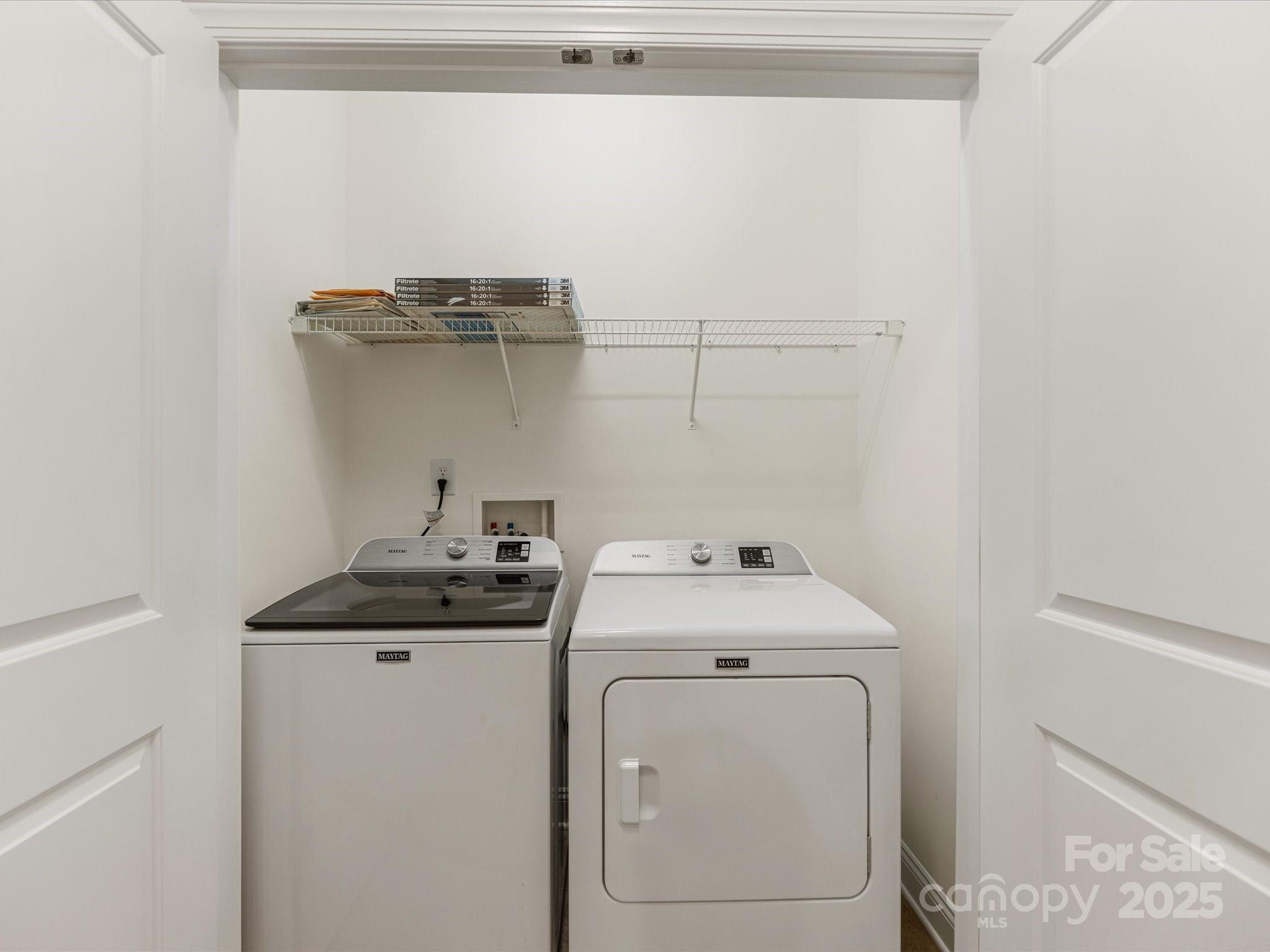 2963 Bellasera Way Matthews, NC 28105 - Photo 18 of 46 a utility room with dryer and washer