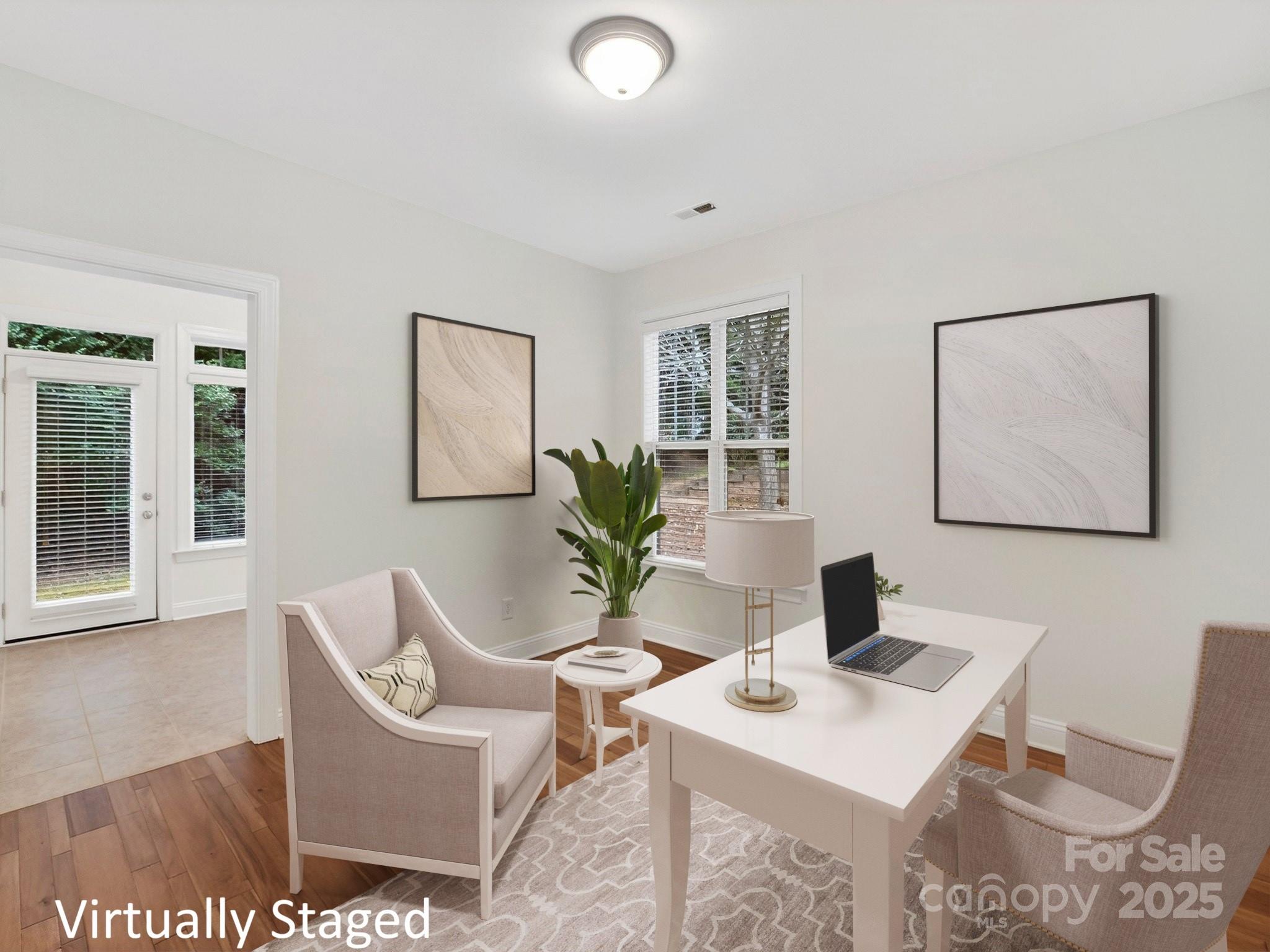 2963 Bellasera Way Matthews, NC 28105 - Photo 19 of 46 a view of a workspace with furniture and bathroom