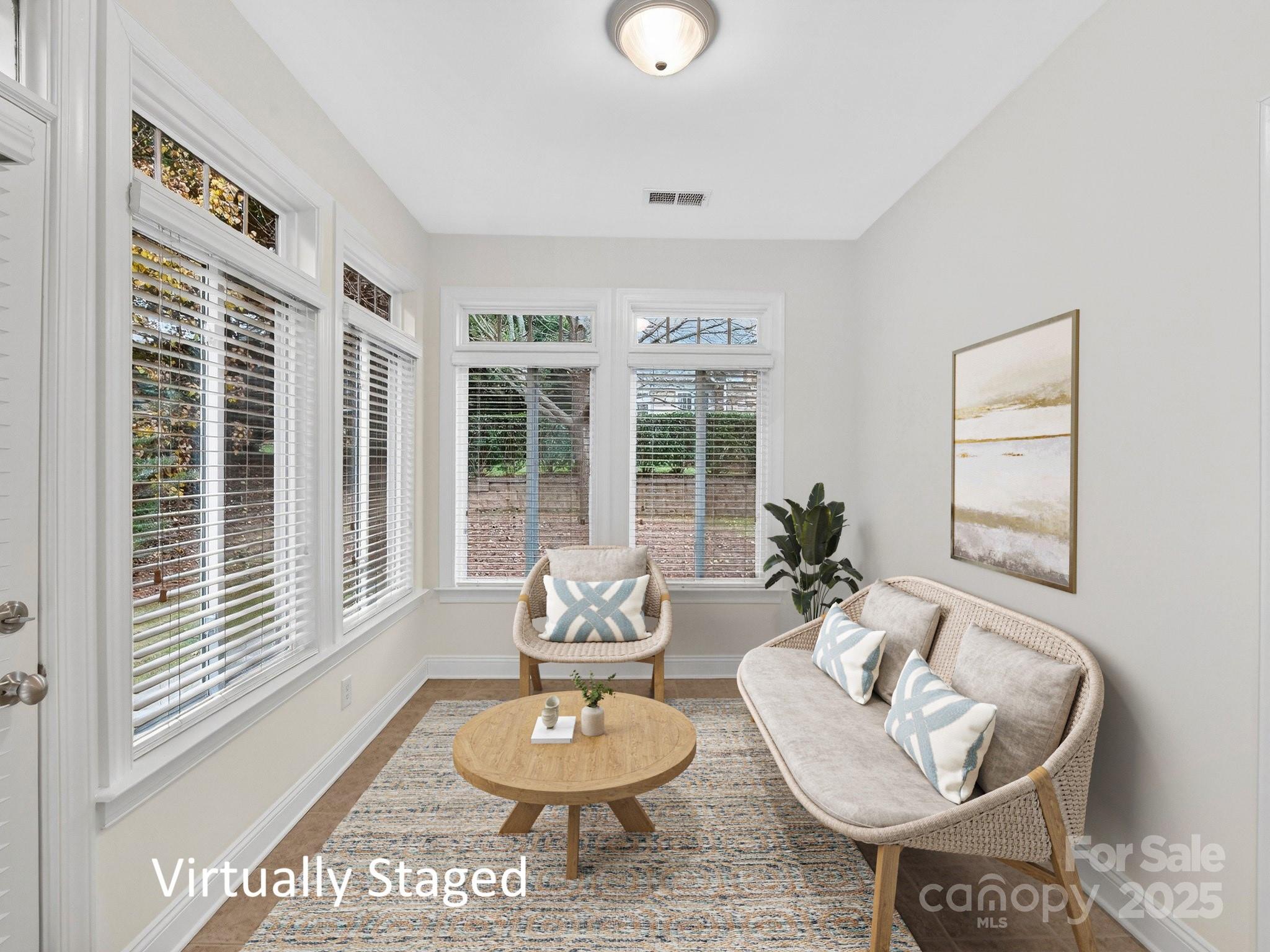 2963 Bellasera Way Matthews, NC 28105 - Photo 34 of 46 a living room with furniture and a large window