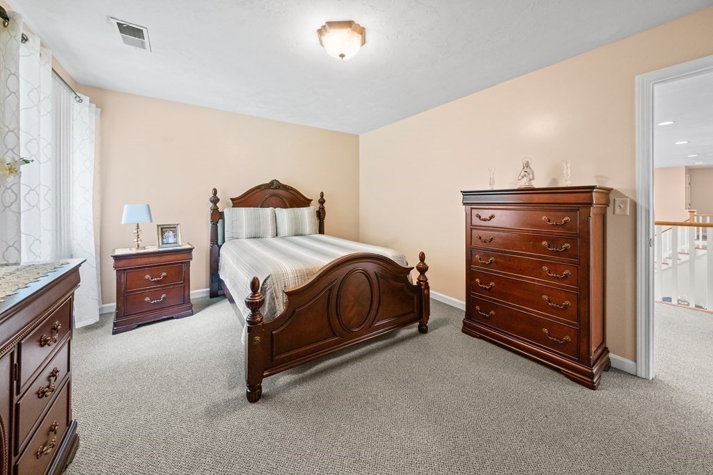 28 Gammons Road Acushnet, MA 02743 - Photo 13 of 39 a bedroom with a bed and a dresser
