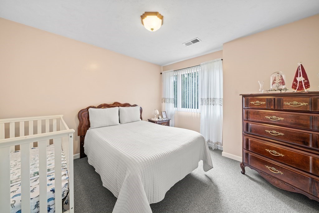 28 Gammons Road Acushnet, MA 02743 - Photo 15 of 39 a bedroom with a bed and a window