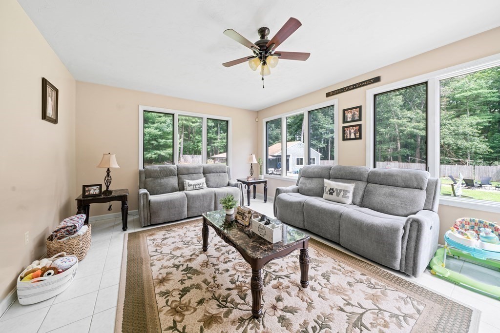 28 Gammons Road Acushnet, MA 02743 - Photo 19 of 39 a living room with furniture and a large window