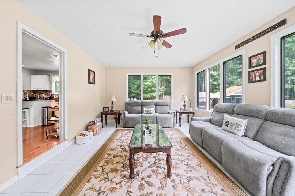 28 Gammons Road Acushnet, MA 02743 - Photo 20 of 39 a living room with furniture and a large window
