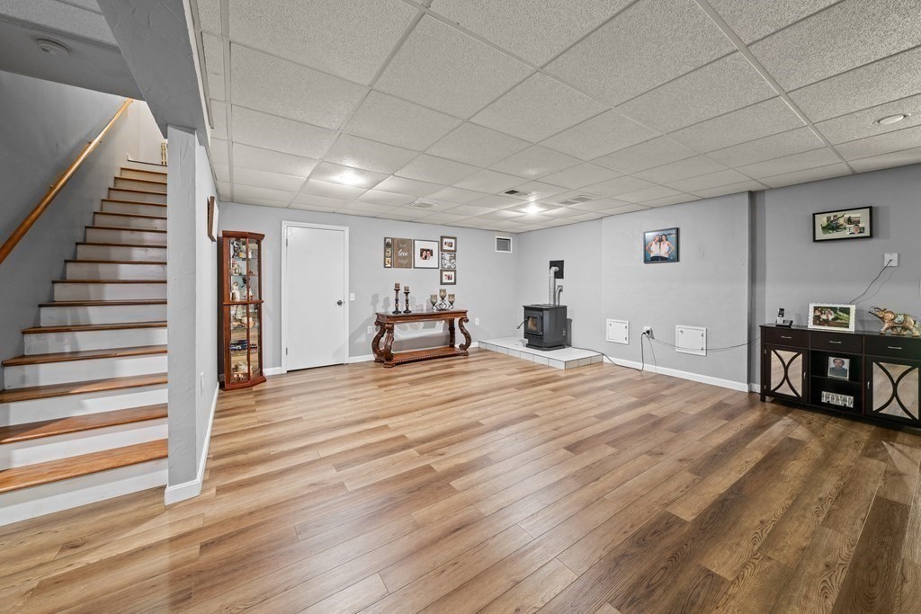 28 Gammons Road Acushnet, MA 02743 - Photo 28 of 39 a room with wooden floor and furniture