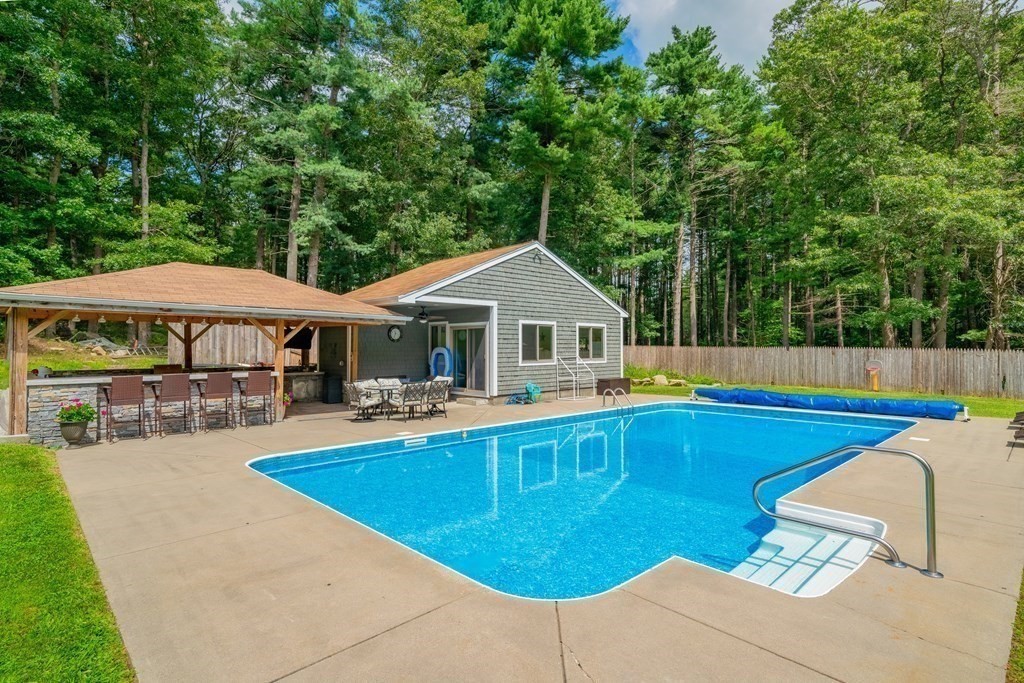 28 Gammons Road Acushnet, MA 02743 - Photo 30 of 39 a view of house with swimming pool outdoor seating and yard