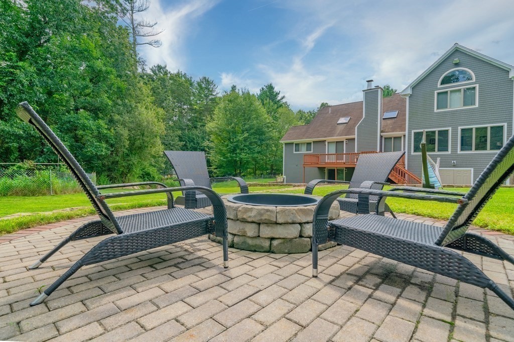 28 Gammons Road Acushnet, MA 02743 - Photo 33 of 39 a view of a backyard with swimming pool and sitting area