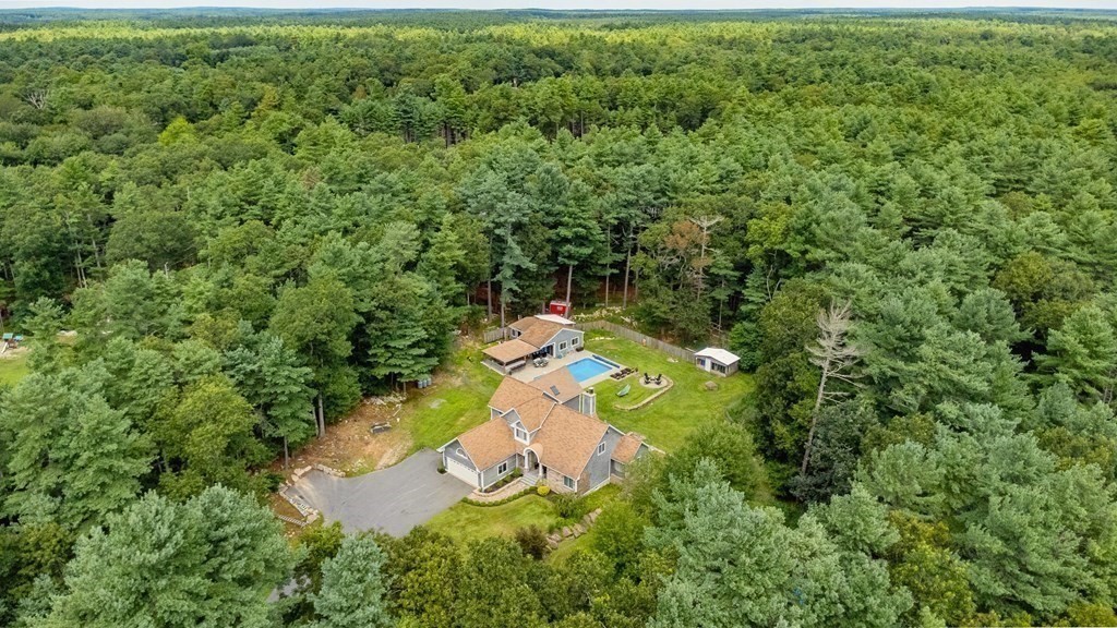 28 Gammons Road Acushnet, MA 02743 - Photo 38 of 39 a backyard of a house with a yard and fountain
