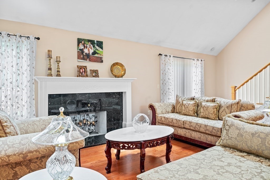 28 Gammons Road Acushnet, MA 02743 - Photo 6 of 39 a living room with furniture and a fireplace