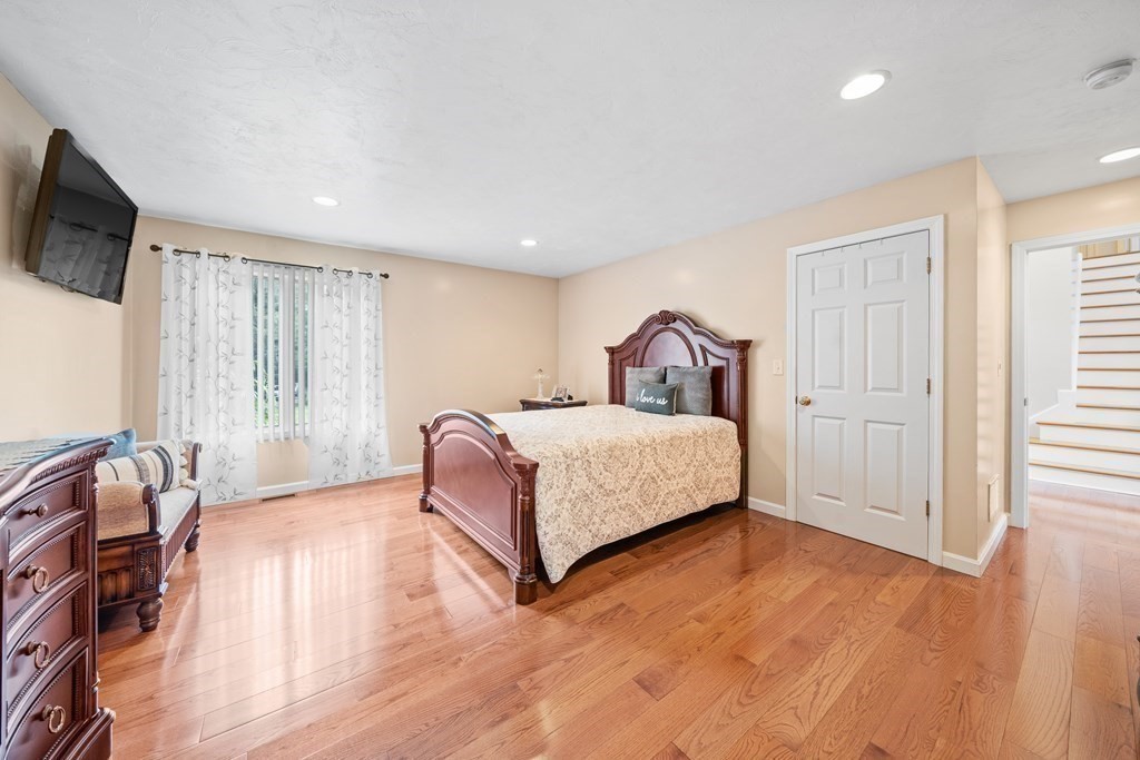 28 Gammons Road Acushnet, MA 02743 - Photo 7 of 39 a bedroom with a bed a flat screen tv and dresser