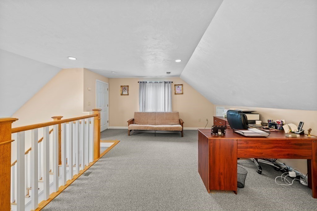 28 Gammons Road Acushnet, MA 02743 - Photo 10 of 39 a livingroom with workspace and a couch