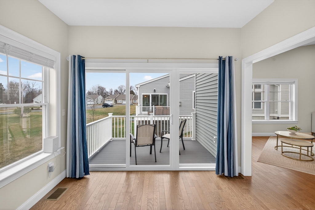 10 Logans Run, Unit 10 Millbury, MA 01527 - Photo 13 of 42 a view of a hallway with furniture and front door