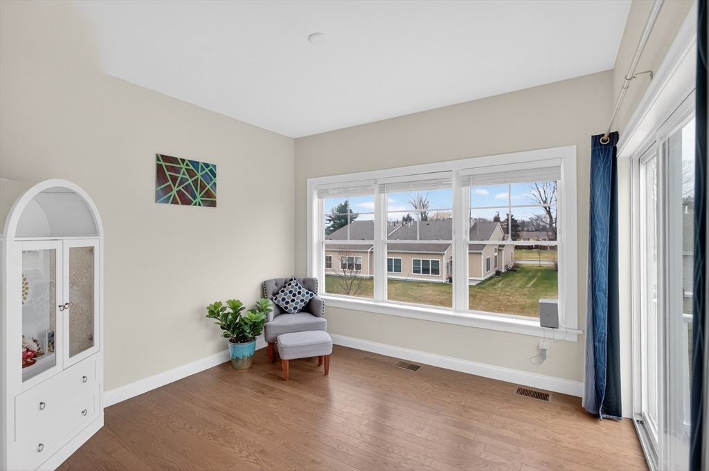 10 Logans Run, Unit 10 Millbury, MA 01527 - Photo 15 of 42 a living room with furniture and a window