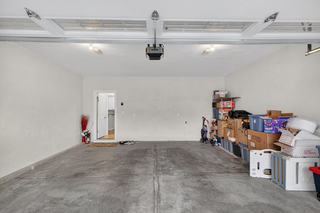10 Logans Run, Unit 10 Millbury, MA 01527 - Photo 2 of 42 a view of storage and utility room