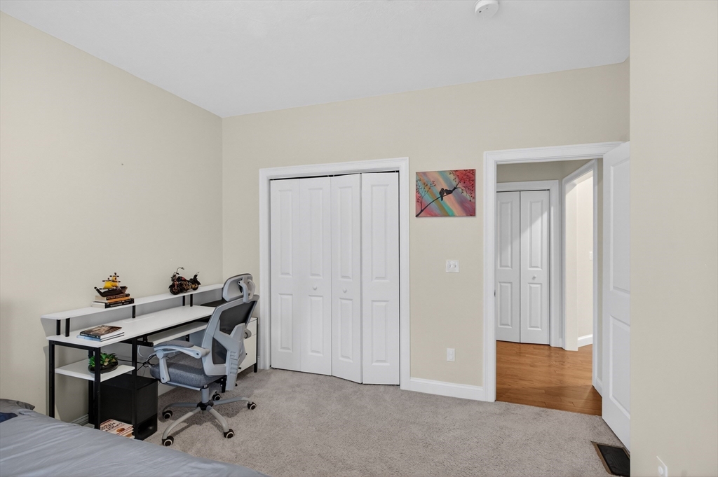 10 Logans Run, Unit 10 Millbury, MA 01527 - Photo 30 of 42 a view of a workspace with furniture