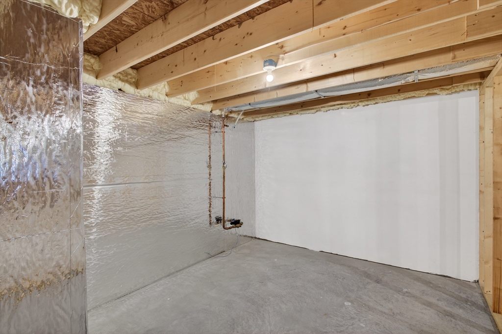 10 Logans Run, Unit 10 Millbury, MA 01527 - Photo 39 of 42 a view of a room with an empty space