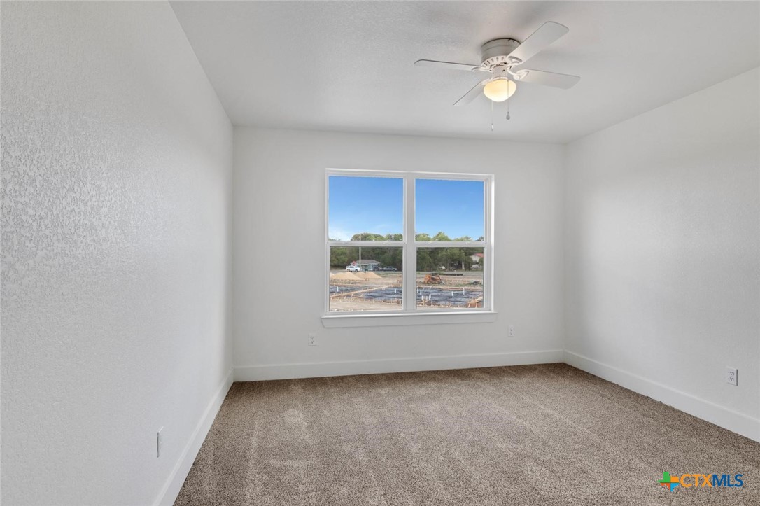 1920 Royal Loop Belton, TX 76513 - Photo 10 of 15 a view of a big room with a window and a ceiling fan