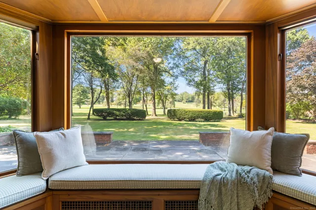 a living room with a couch and a table