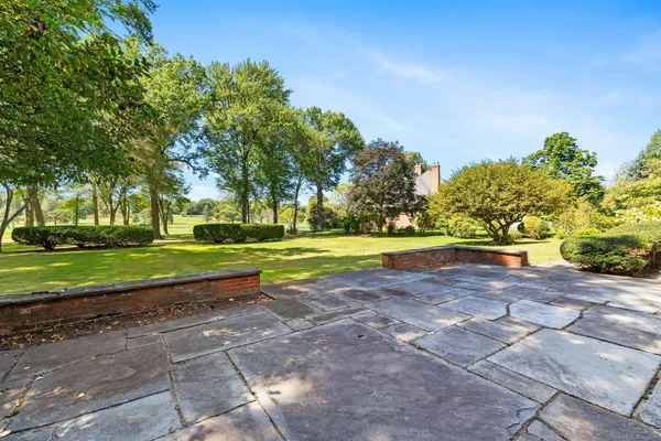 a view of a house with a big yard