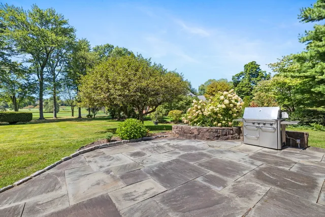 a view of a yard with an outdoor space