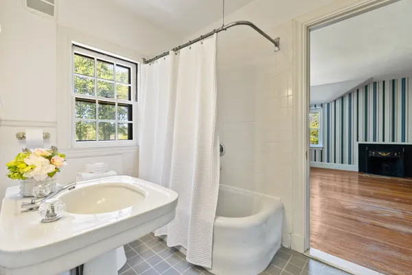 a bathroom with a sink and a bathtub