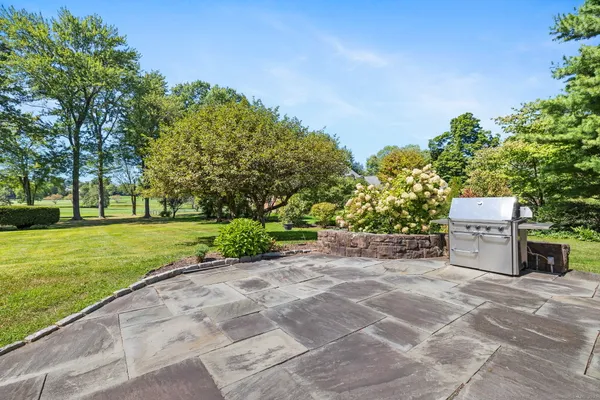 a view of a yard with an outdoor space