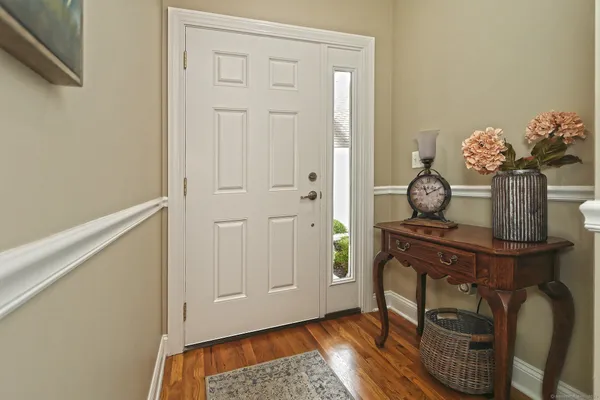a view of livingroom with furniture and wooden floor