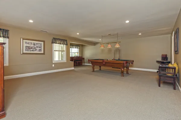 a view of a livingroom with furniture and a couch