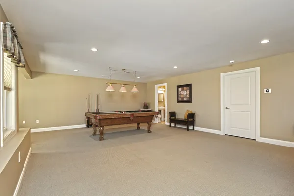 a kitchen with stainless steel appliances granite countertop a stove a sink dishwasher and a microwave oven with cabinets