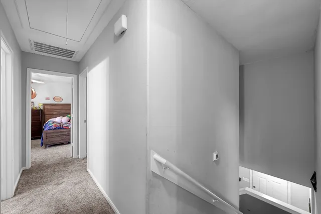 a view of a livingroom from a gallery