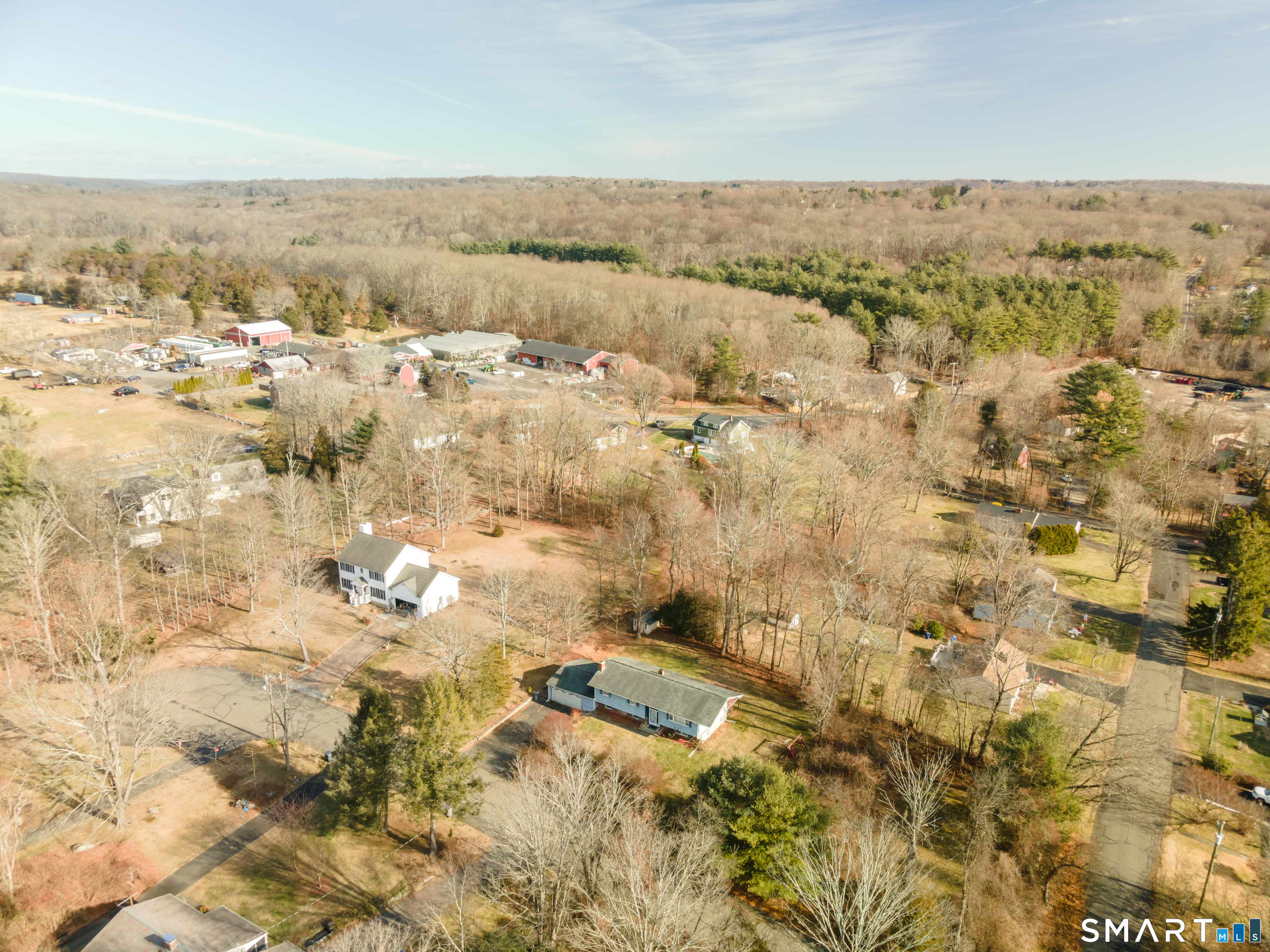 6 Maple Circle Monroe, CT 06468 - Photo 2 of 19 Land from the right of house to the road is included in the parcel.