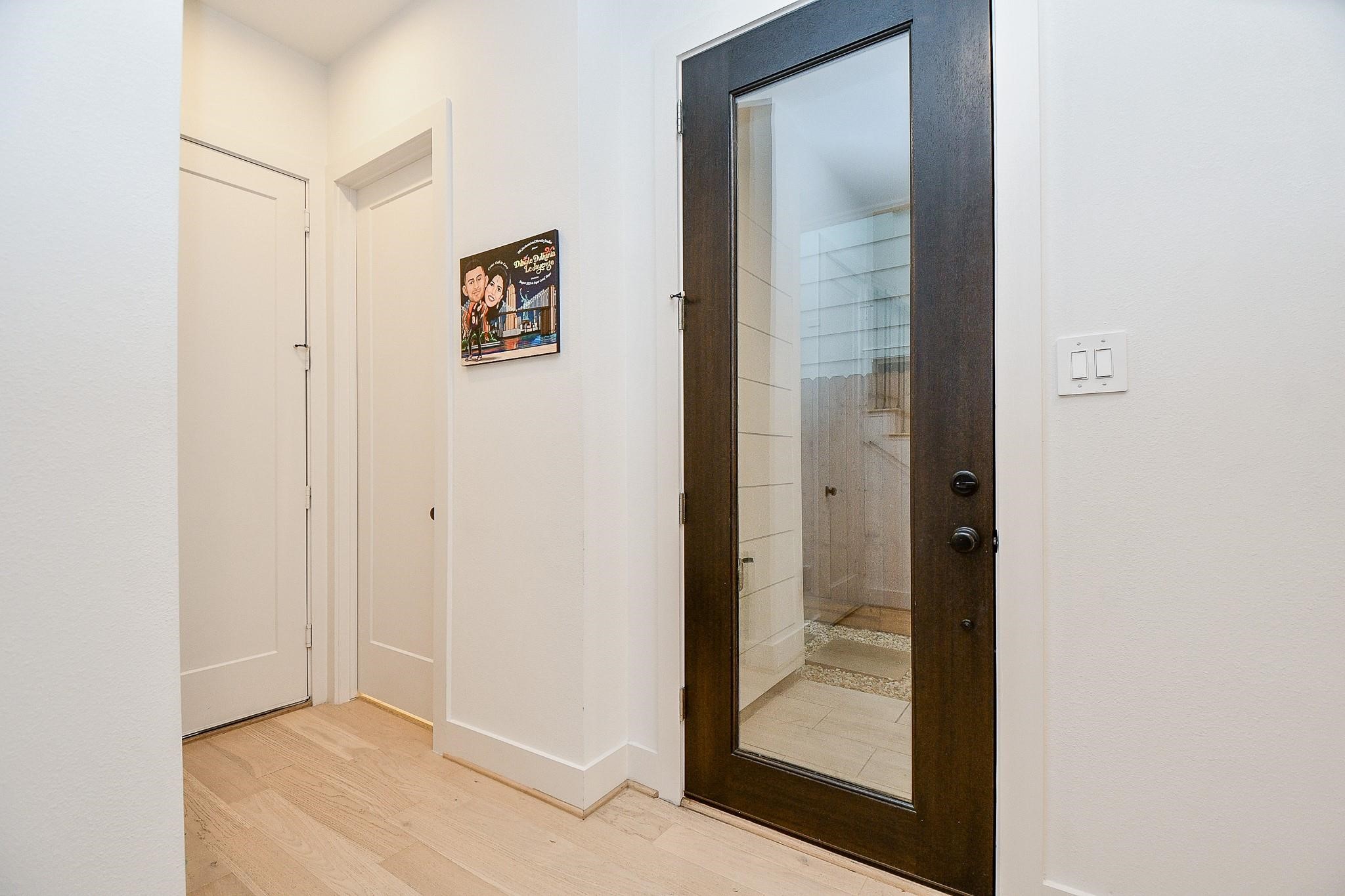 4403 Greeley Street Houston, TX 77006 - Photo 4 of 28 a view of a hallway with wooden floor