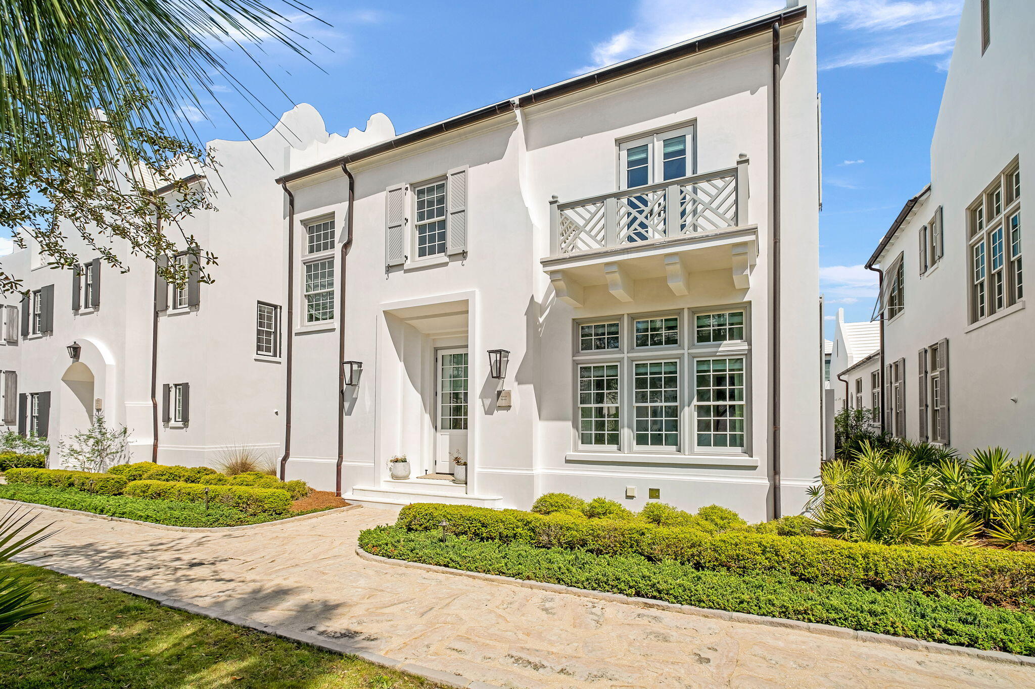 91 Whalebone Alley Inlet Beach, FL 32461 - Photo 6 of 17 a front view of a house with a garden
