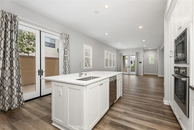 a kitchen with a stove and a kitchen