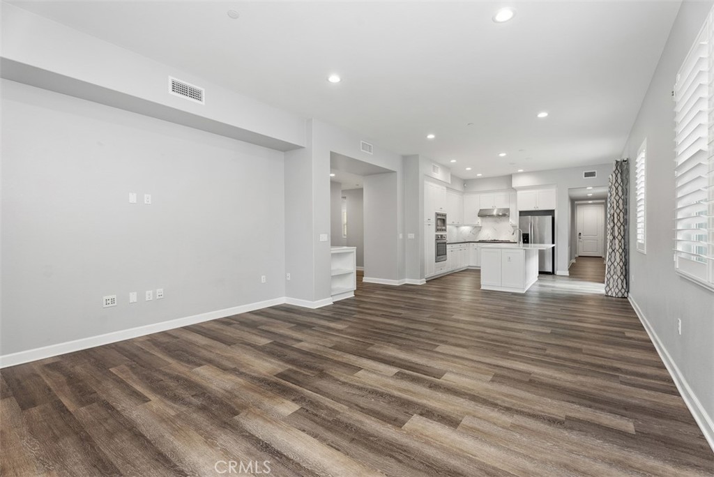 179 Follyhatch Irvine, CA 92618 - Photo 3 of 48 a view of kitchen with wooden floor