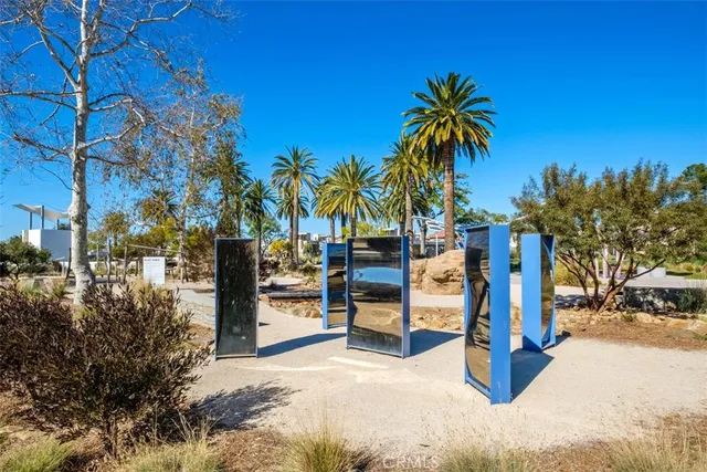 a view of a park with large trees