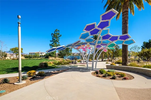 a view of a park with swings and slides