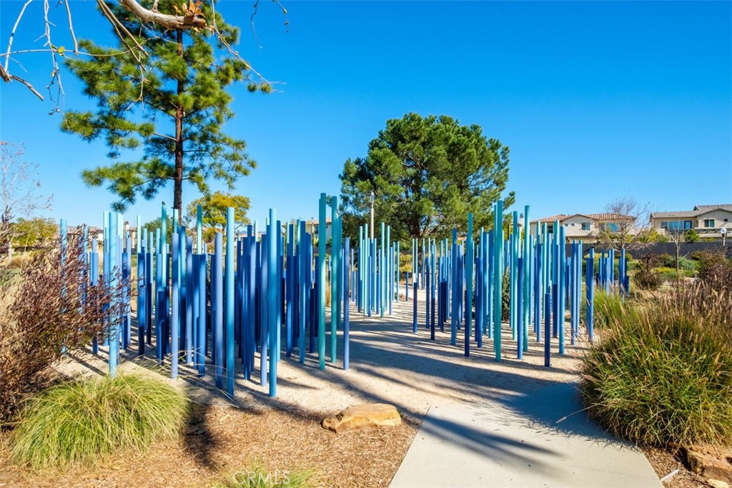 179 Follyhatch Irvine, CA 92618 - Photo 40 of 48 a view of a garden with a building in the background