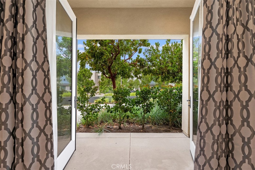 179 Follyhatch Irvine, CA 92618 - Photo 6 of 48 a view of a garden from a window