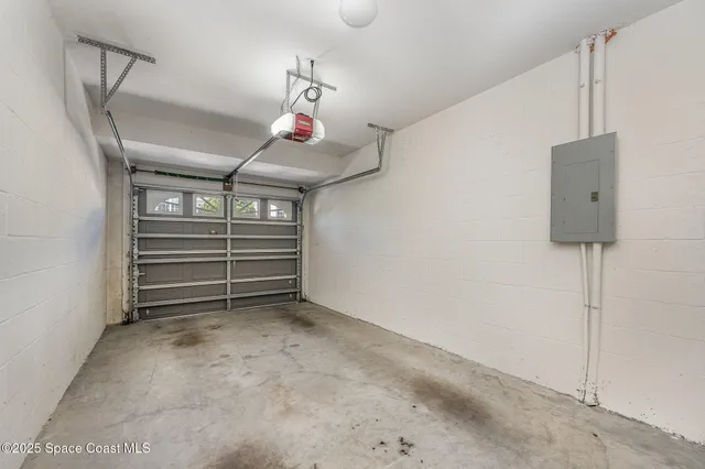 a view of room with a flat screen tv