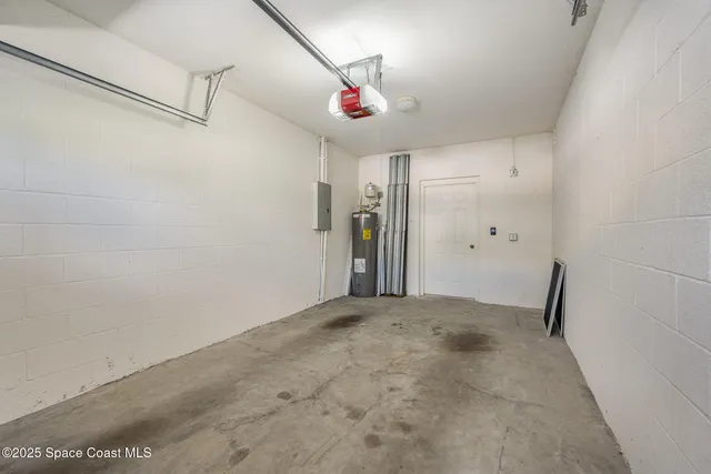 a view of a room with a flat screen tv