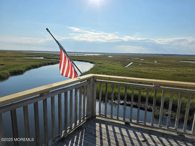 a balcony with an ocean view