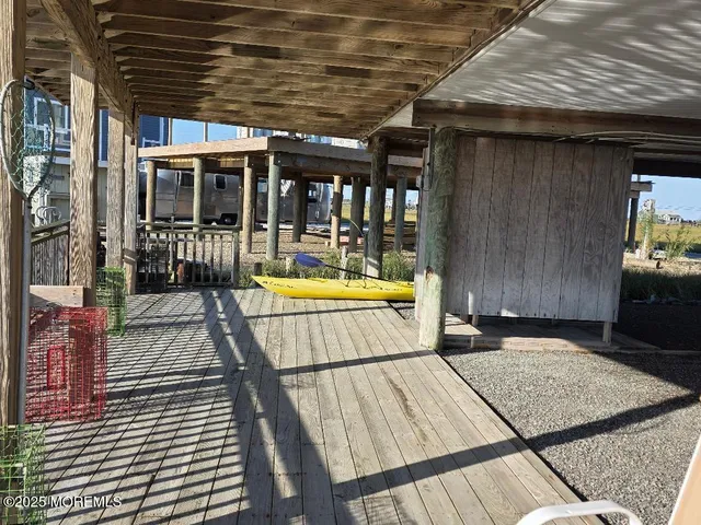 a view of a balcony with chairs